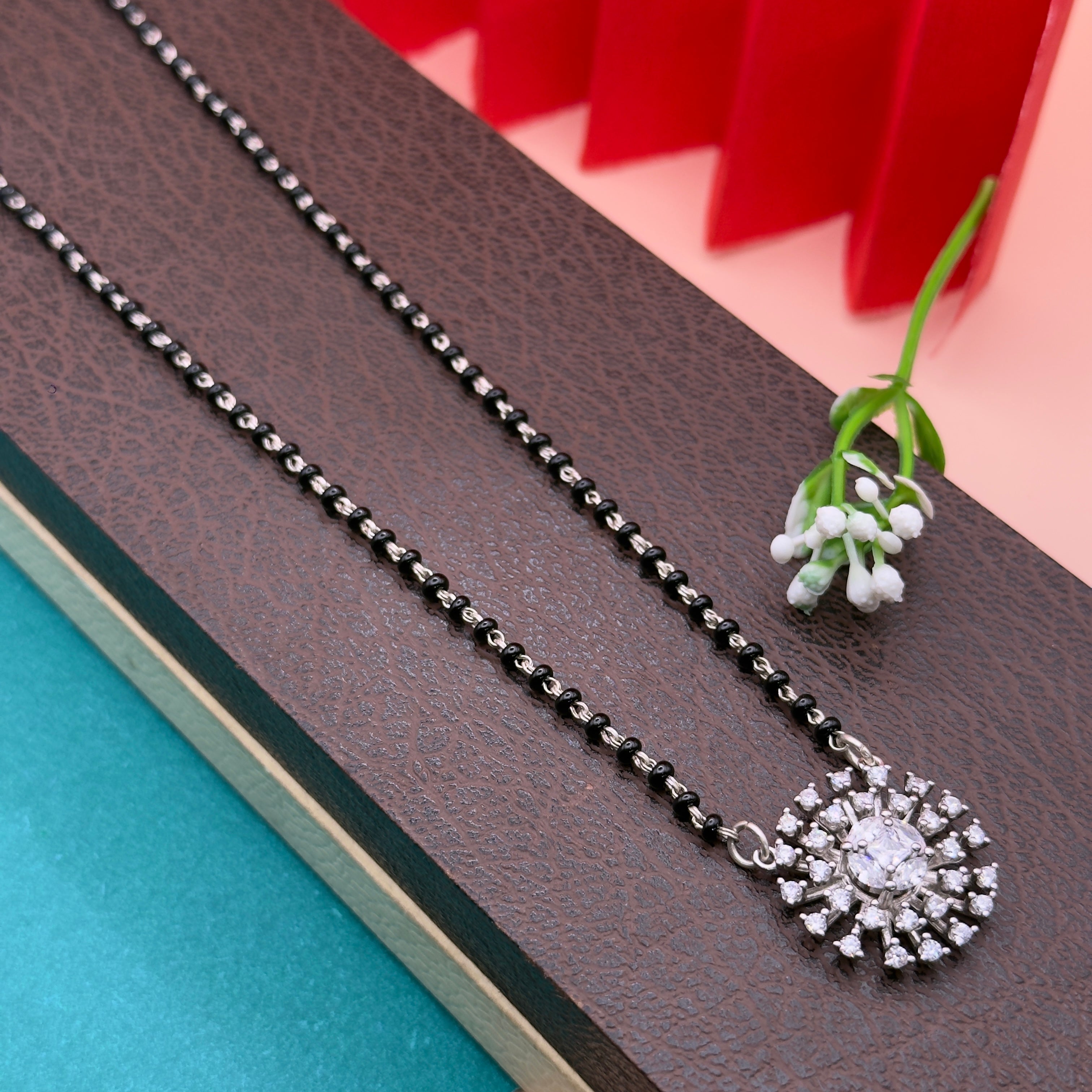 Silver CZ Floral Mangalsutra Set with Matching Earrings.